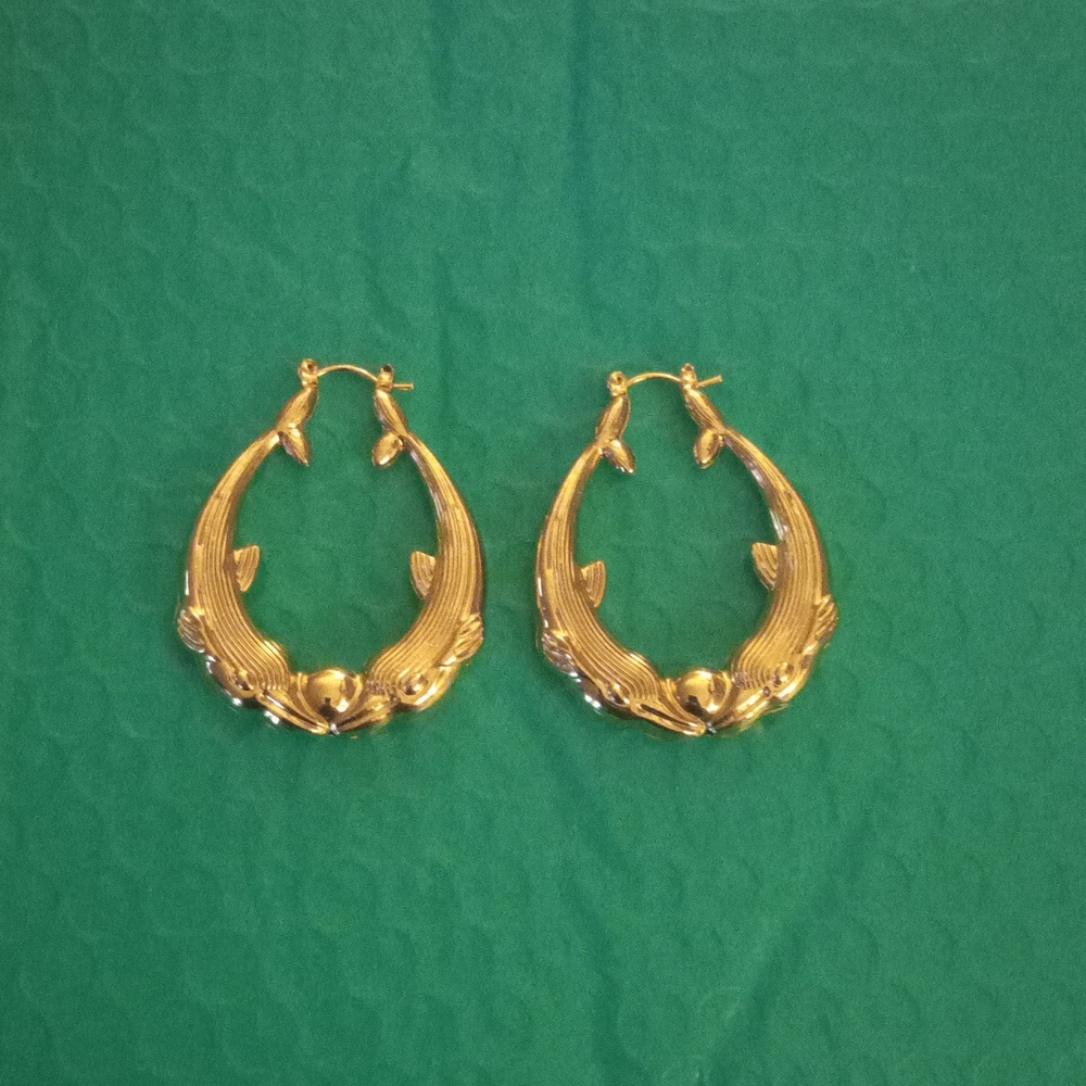 Big gold tone dolphin earrings